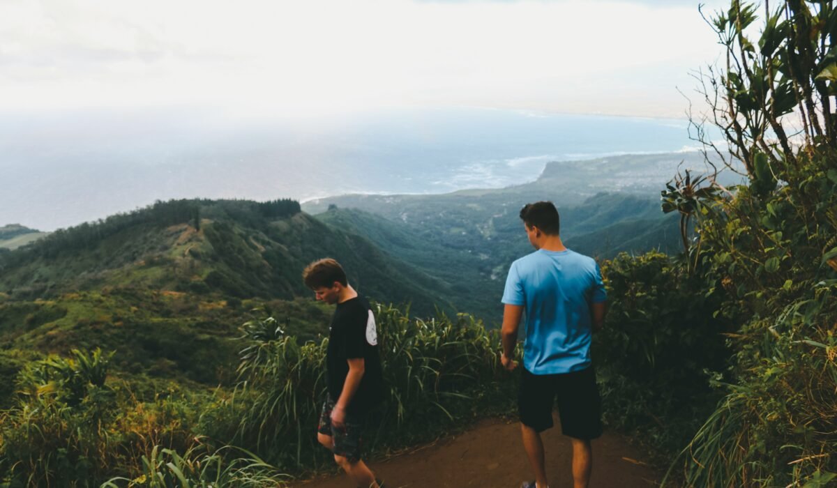 image of hikers wearing shorts while hiking on mountain